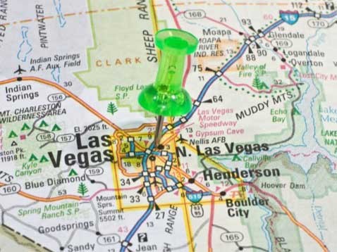 Close up of  a thumb tack in a map of Las Vegas